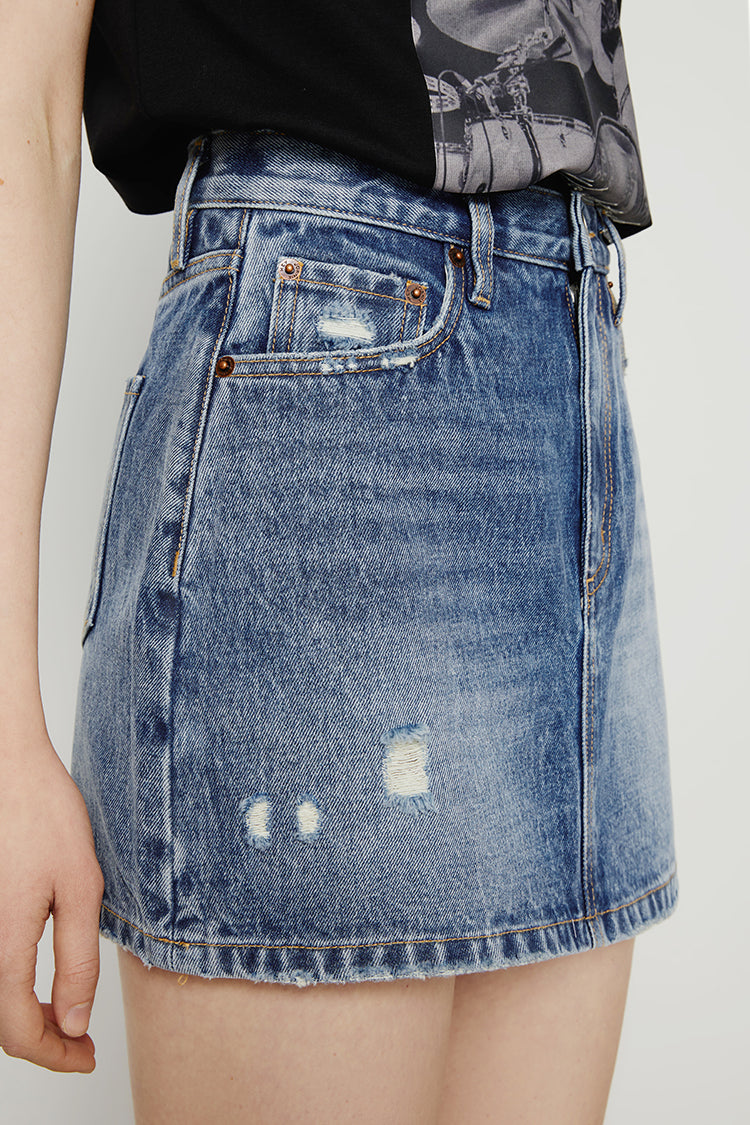 Vintage 80's mini skirt by Hey Joanie, featuring classic retro style with vibrant colors and a fitted waistband.