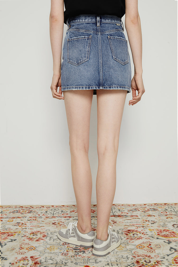 Vintage 80s Hey Joanie mini skirt in vibrant colors, high-waisted with a fitted silhouette and retro style.