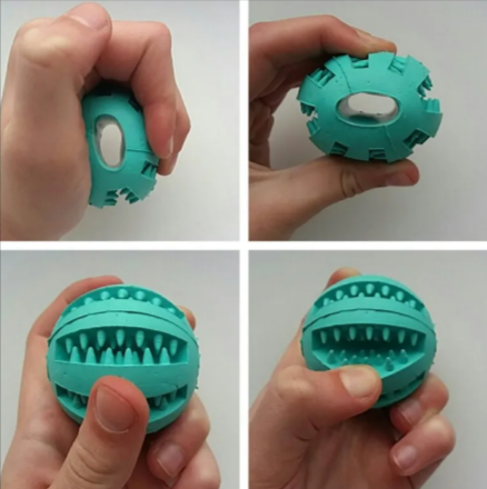 Interactive rubber slow feeder dog ball by C&M treasures, designed for engaging play and food dispensing for dogs.