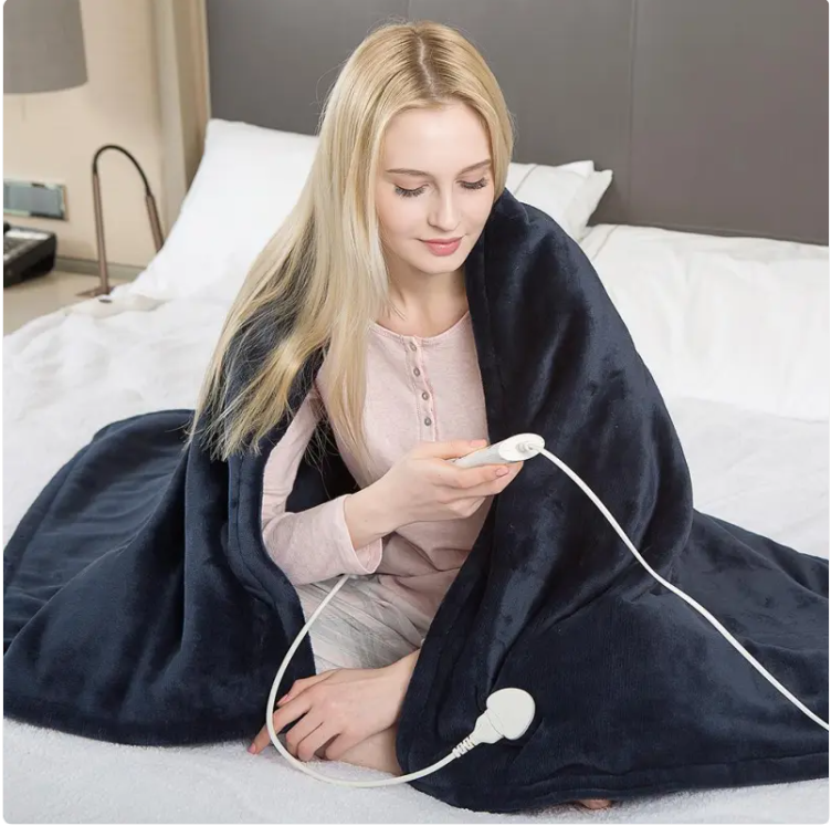 C&M treasures 3-level safety heated blanket with adjustable temperature, showing soft fabric and control panel for warmth regulation.
