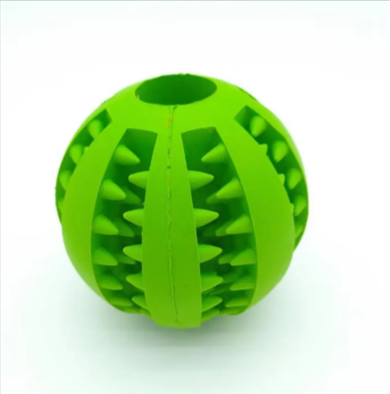 Interactive rubber slow feeder dog ball by C&M Treasures, featuring a textured surface and vibrant colors for engaging play.