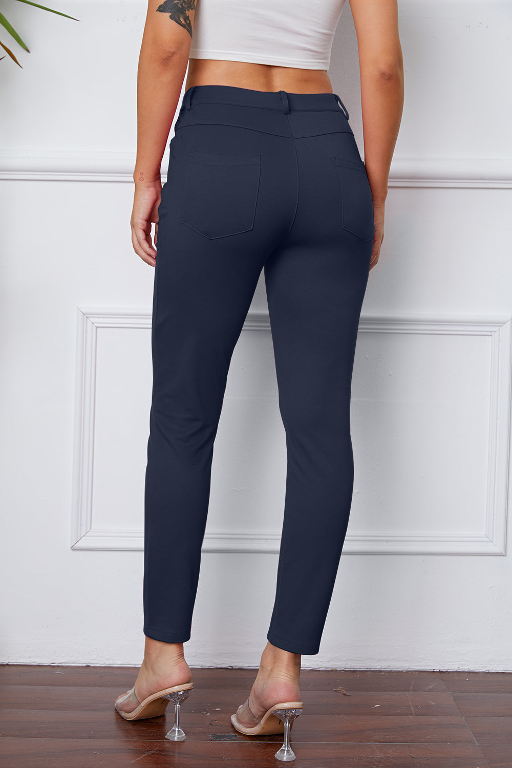 StretchyStitch Pants by Basic Bae, stylish black bottoms with a comfortable, stretchy fabric and modern fit, shown on a model.