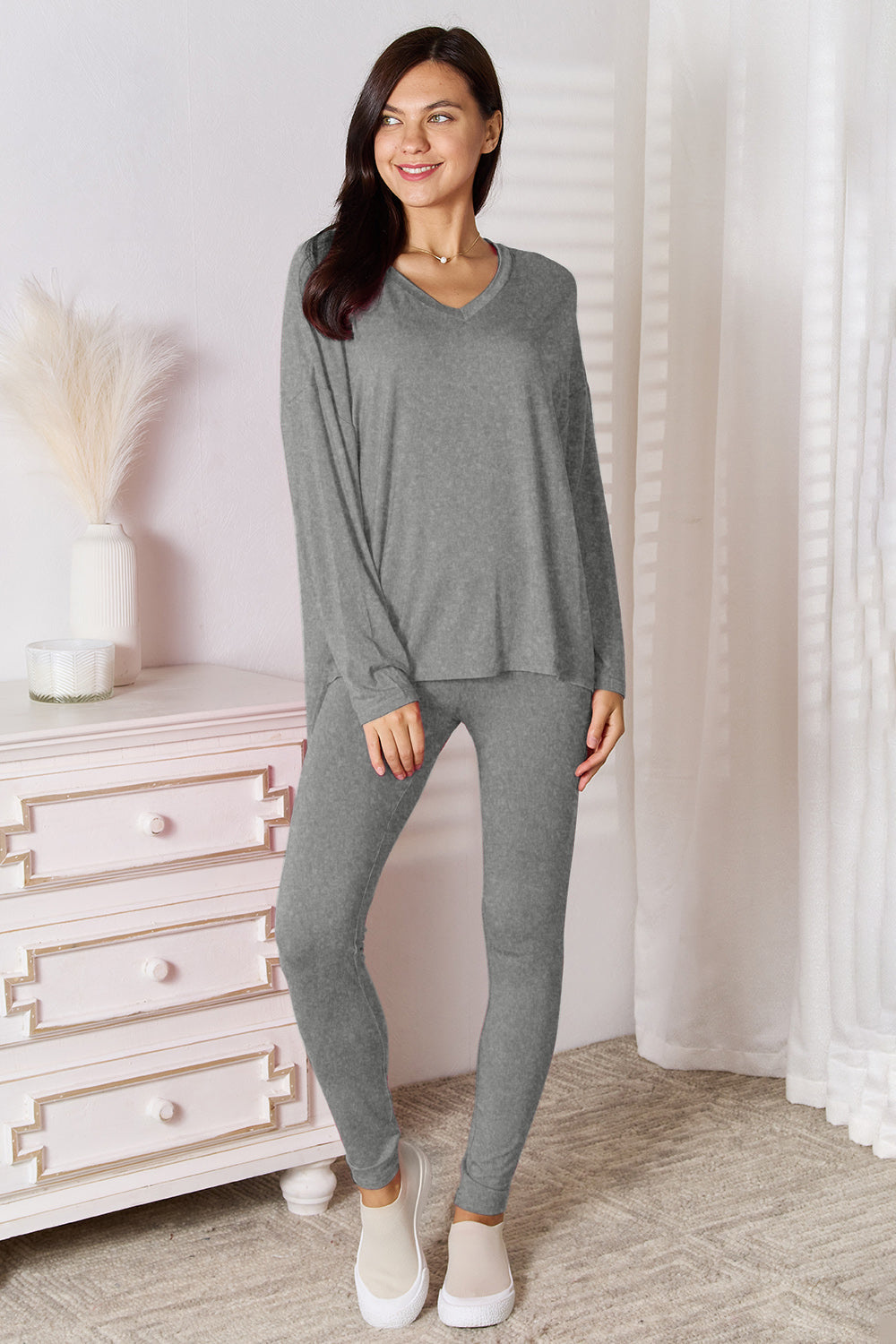 Basic Bae bamboo lounge set with full-size V-neck long sleeve top and matching pants, made from soft, sustainable fabric.