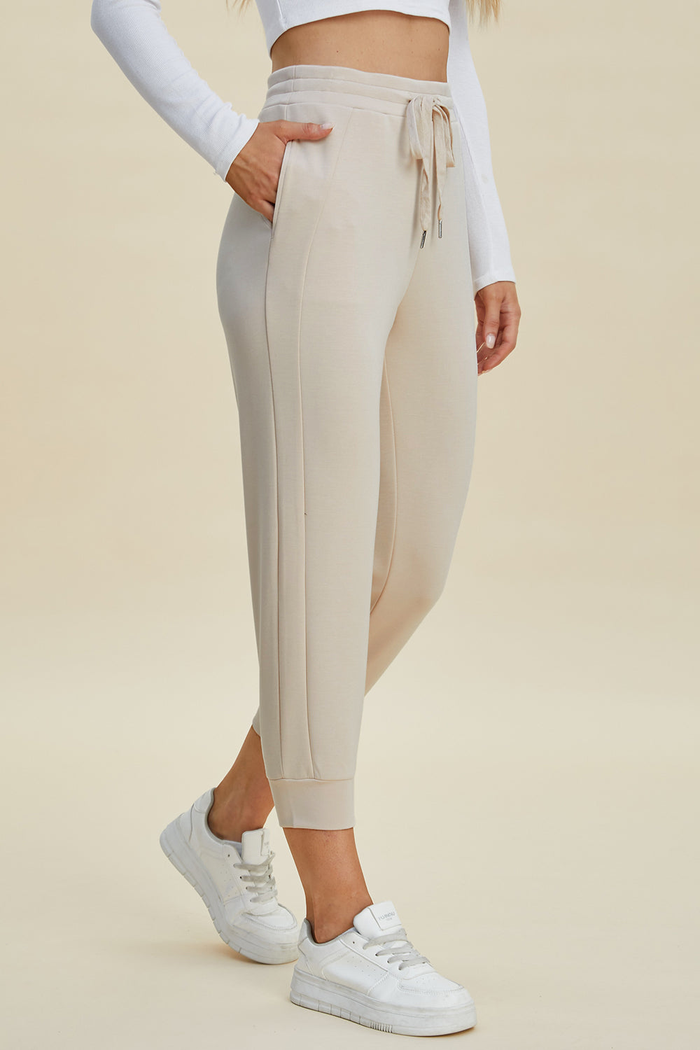 ShopBasicbae Basic Bae high waist air scuba cropped pants with drawstring, featuring a relaxed fit and sporty style.