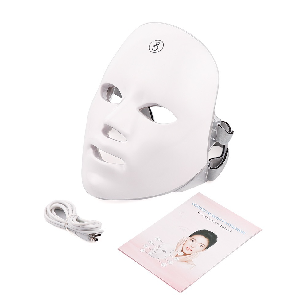 C&M Treasures LED therapy face mask for skin rejuvenation, showing a user wearing a blue light mask on their face.
