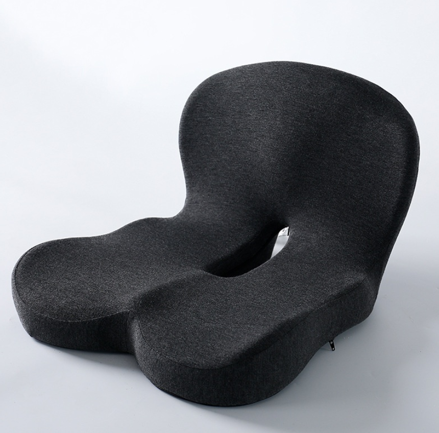 Memory foam ergonomic cushion by C&M Treasures, showing a contoured, soft cushion designed for improved comfort and support.