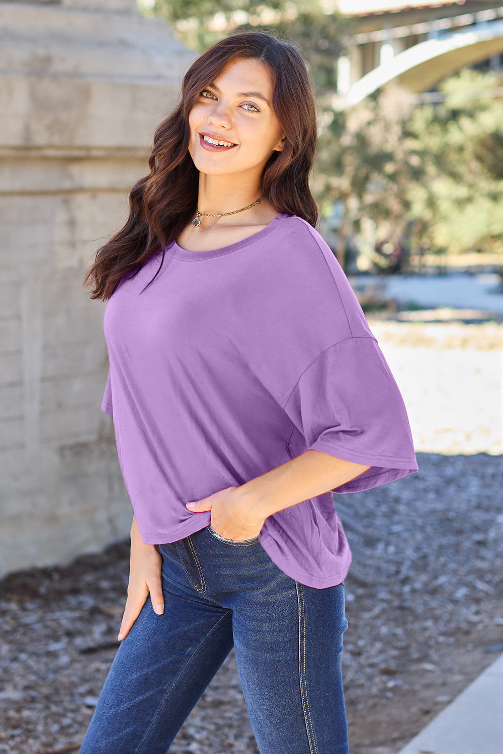 Basic Bae bamboo full-size round neck drop shoulder T-shirt, soft and comfortable tops in natural bamboo fabric, shown on model.