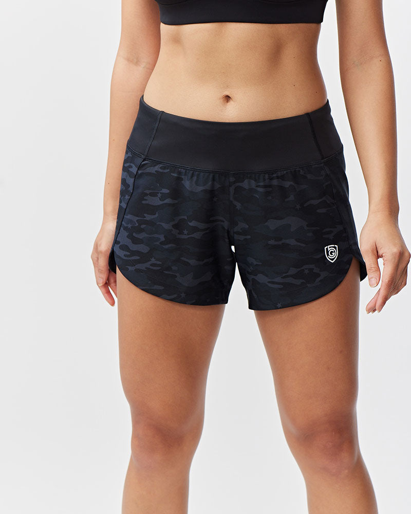 Excel women's workout shorts with camouflage print, designed for training, by Goal Five.