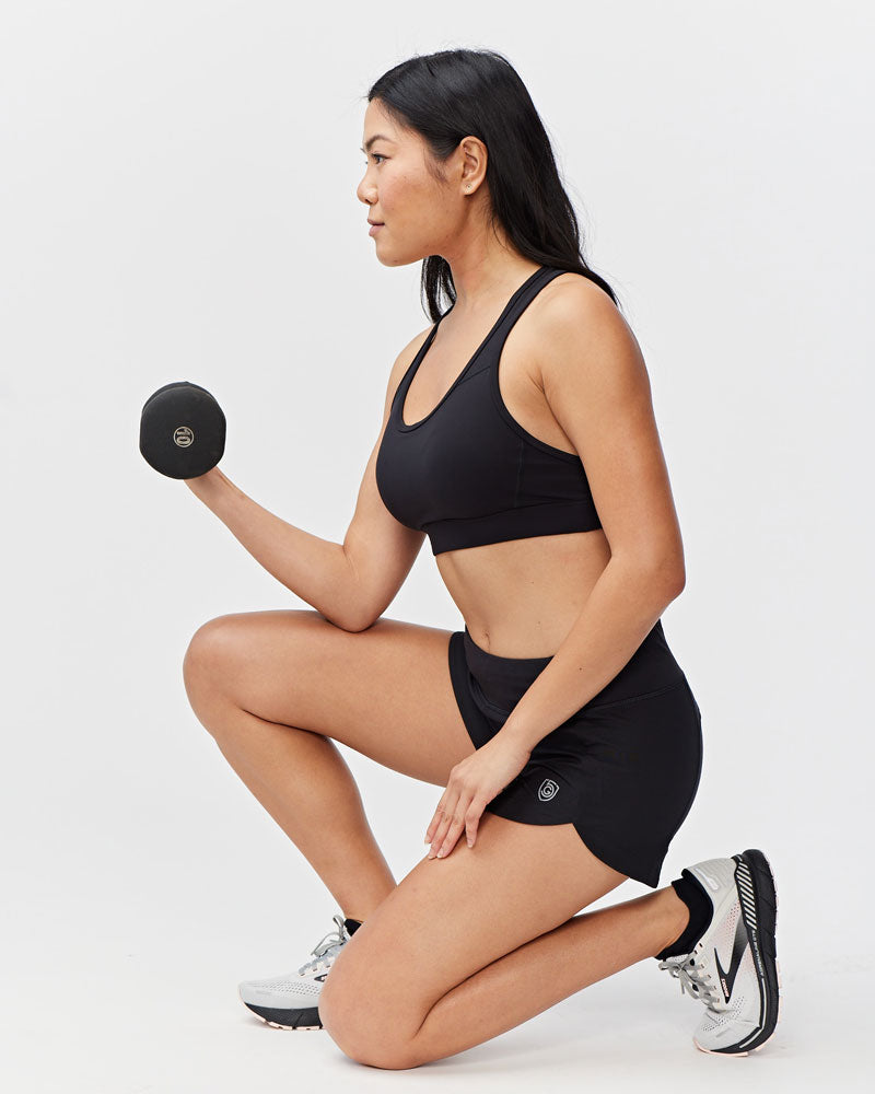 Black Excel women's workout training shorts by Goal Five, featuring a comfortable fit and athletic design.