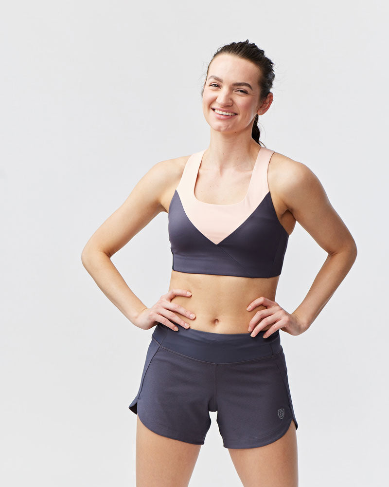 Excel Women's Training Shorts by Goal Five in carbon color, designed for comfortable workout and training activities.