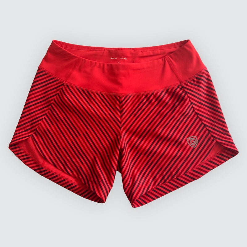 Excel women's training workout shorts by Goal Five in coral with white stripe detail, designed for active fitness and exercise.