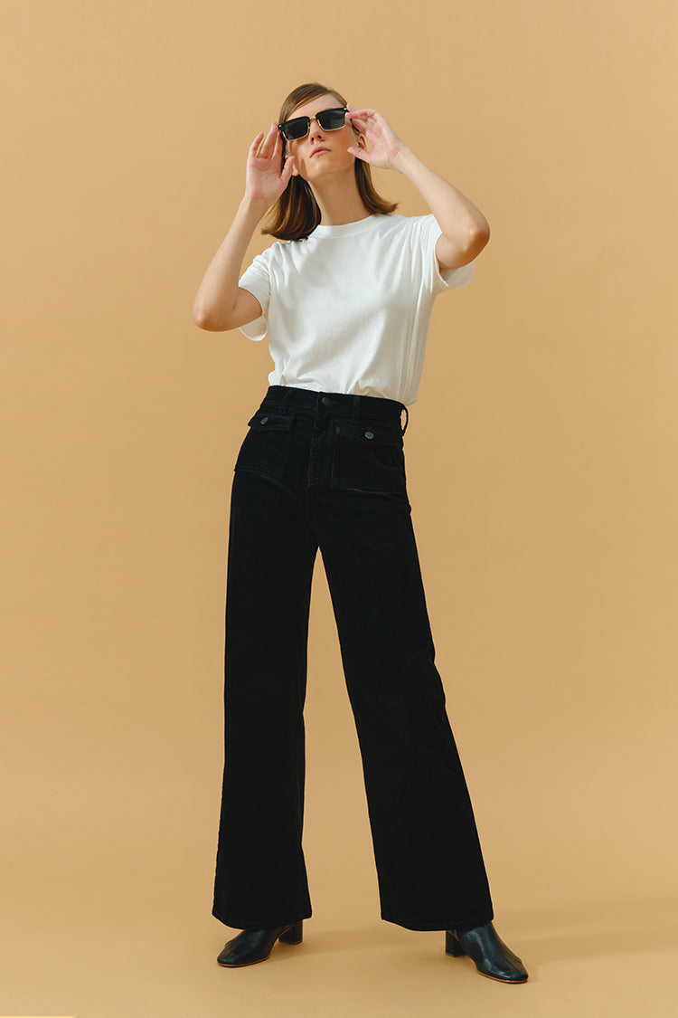 Hey Joanie 80's baggy corduroy pants in deep green, featuring wide legs and high waist, shown on a mannequin.