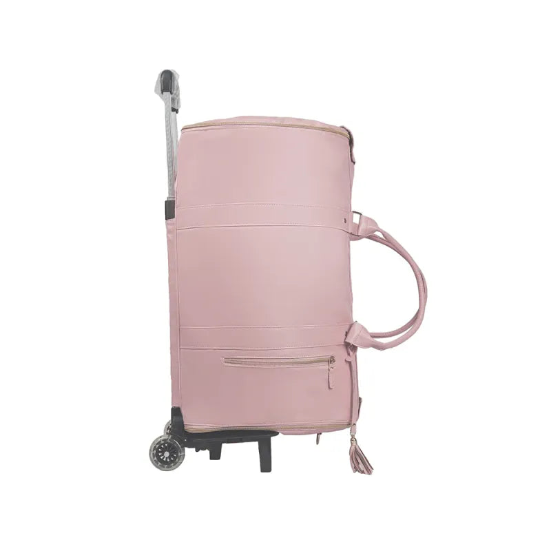Foldable travel bag by C&M Treasures, compact design with multiple compartments, shown folded and partially unfolded.