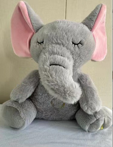Soft baby soothing plush music toy by C&M Treasures featuring colorful plush fabric and a gentle melody for calming infants.