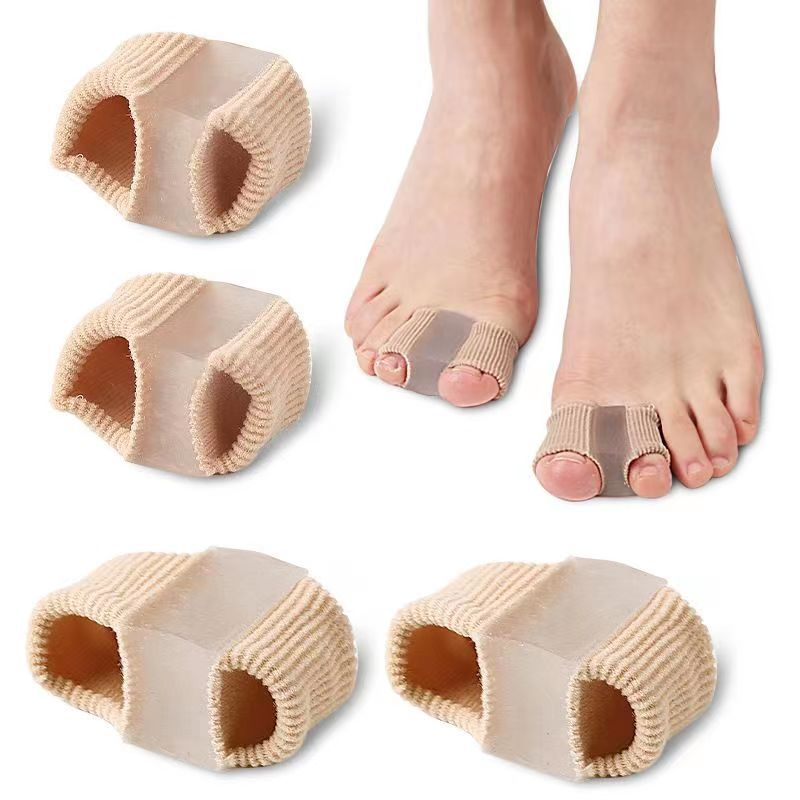 C&M Treasures fiber toe separator, soft gel toe spacer for bunion relief, placed between toes on a white background.