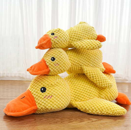 C&M Treasures calming duck toy with soft yellow body and gentle features, designed to soothe and entertain young children.