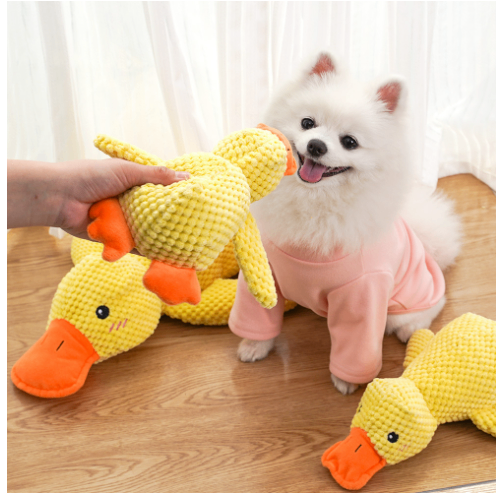 C&M Treasures calming duck toy with soft plush body and gentle expression, designed to soothe and comfort pets or children.