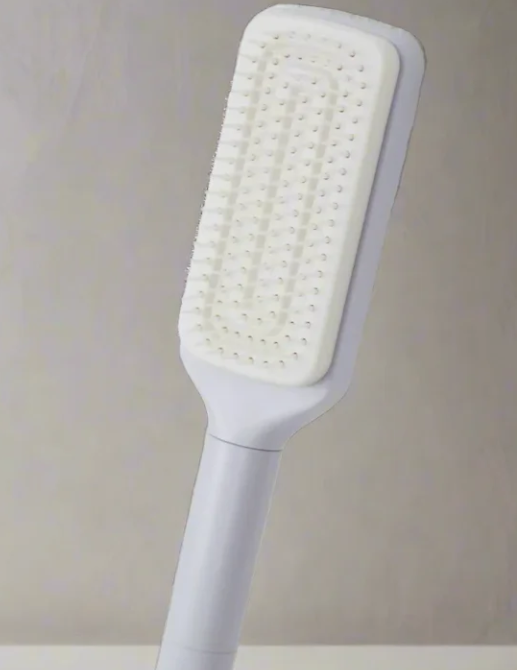 C&M treasures 4-in-1 self-cleaning brush showing multi-functional brush heads and ergonomic handle for versatile cleaning.