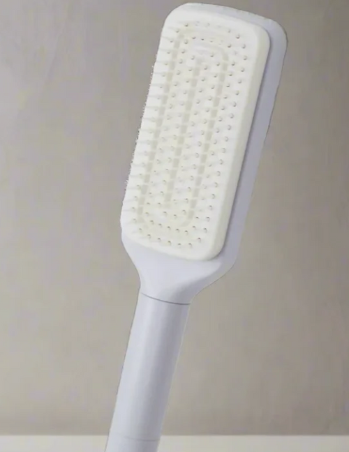 C&M treasures 4-in-1 self-cleaning brush showing multi-functional brush heads and ergonomic handle for versatile cleaning.