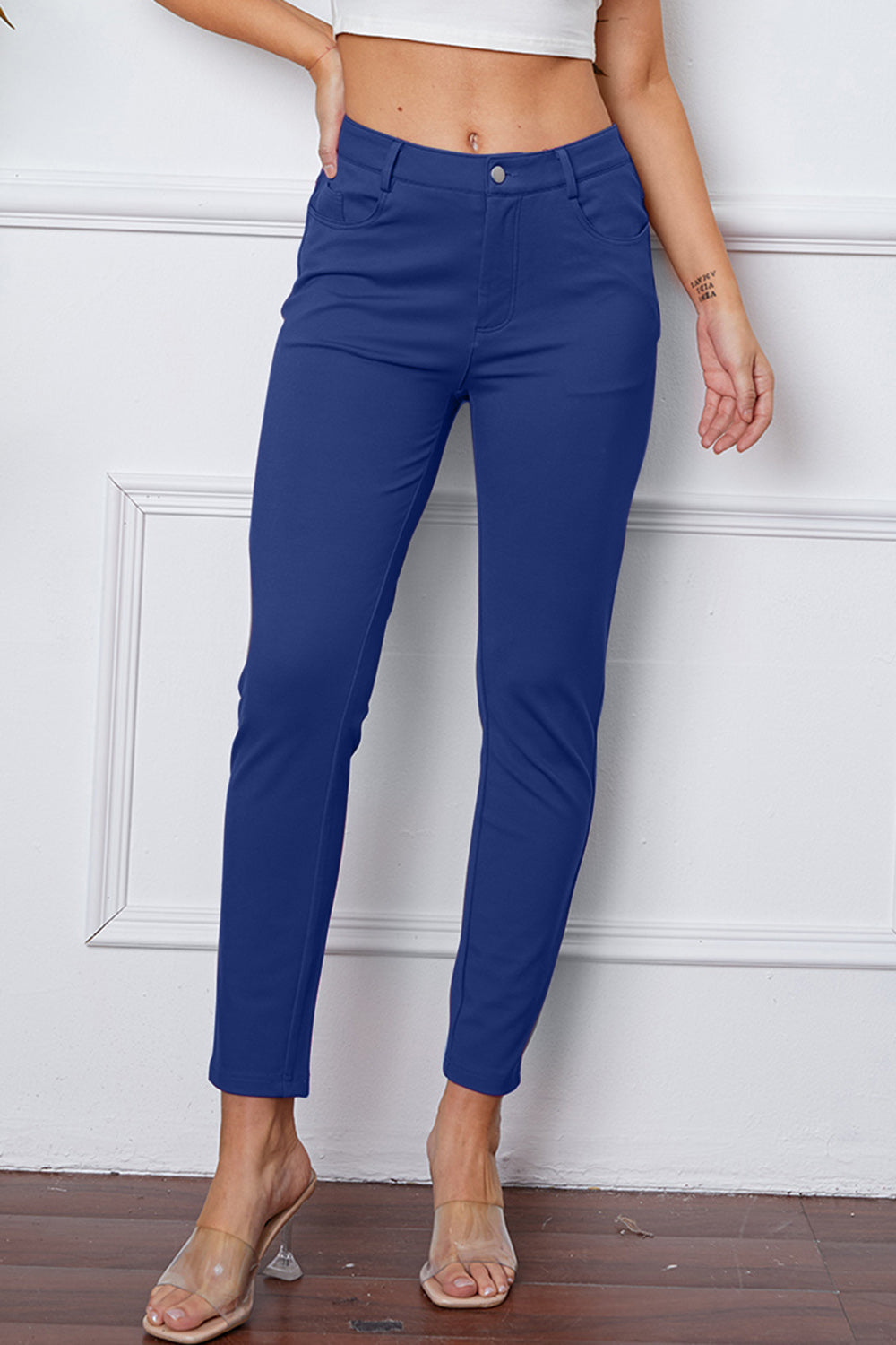 StretchyStitch Pants by Basic Bae, stylish black bottomed pants with a comfortable fit, shown on a model.