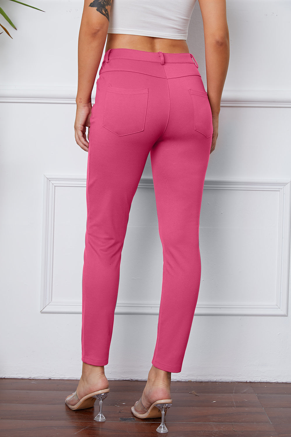 StretchyStitch Pants by Basic Bae, stylish and comfortable black bottoms with a fitted design, shown on a model.