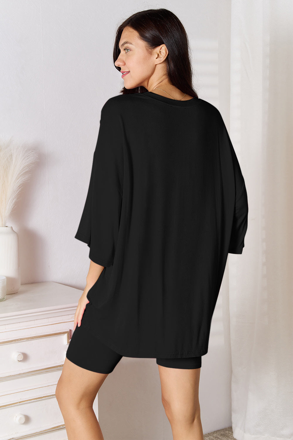 ShopBasicbae bamboo full size round neck drop shoulder T-shirt and shorts set, featuring a relaxed fit and casual style.