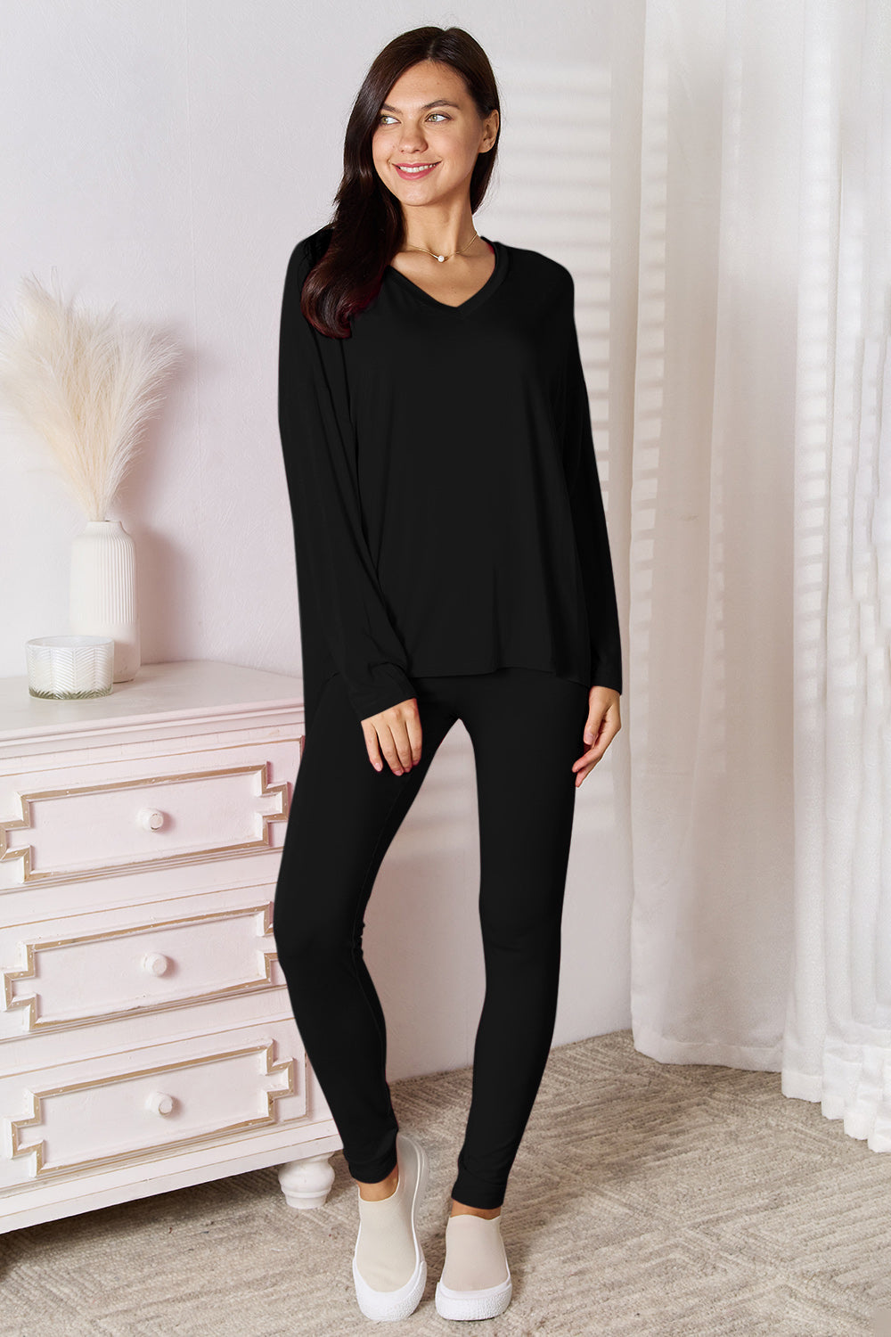 ShopBasicbae bamboo lounge set featuring a full-size V-neck long sleeve top and matching pants, comfortable and stylish for relaxed wear.