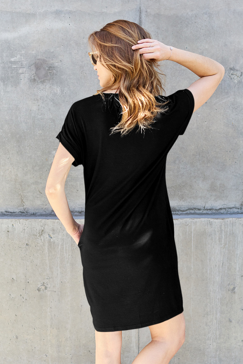 ShopBasicbae bamboo full-size round neck short sleeve dress with pockets, featuring a casual and comfortable design.
