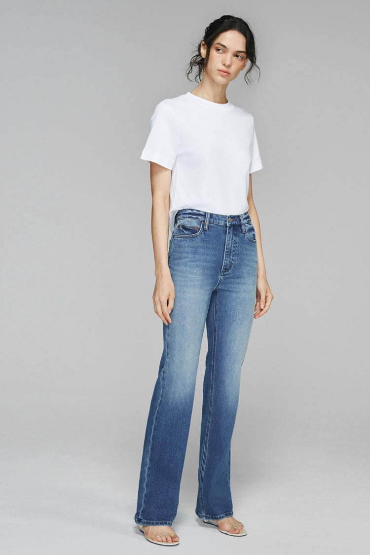 Hey Joanie Barbara high-rise bootcut jeans, front view showing classic denim with a fitted waist and flared leg style.