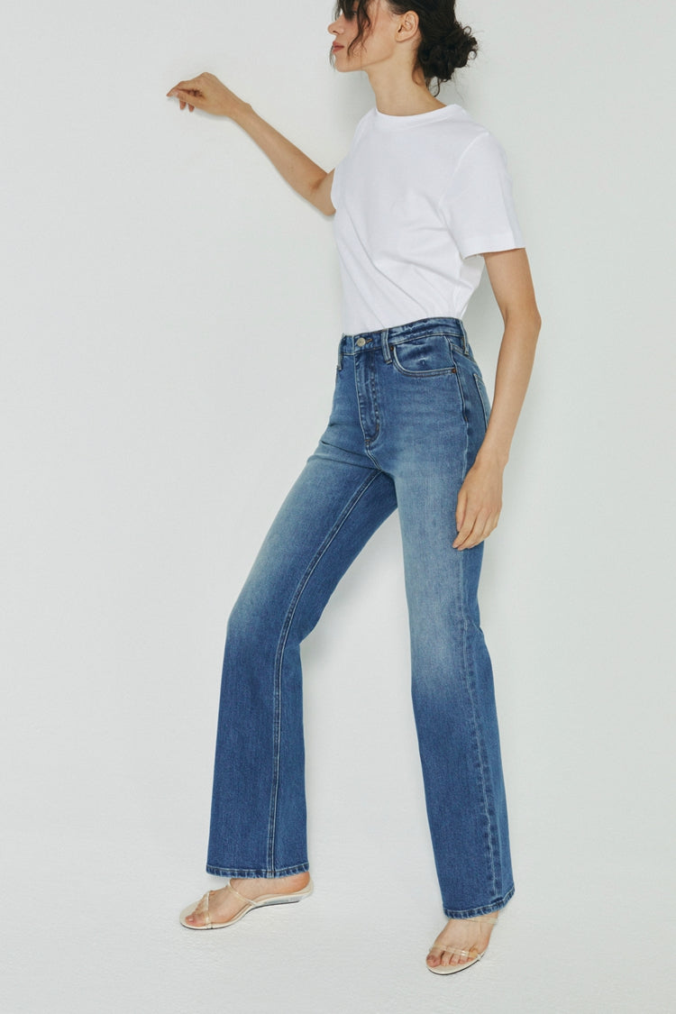 Hey Joanie Barbara high-rise bootcut jeans, front view showing classic denim fabric and high waist style.
